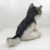 Peluche loup assis