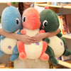 Peluche bébé dinosaure vert