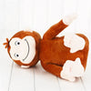 Peluche singe souriante
