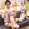 Peluche chat gris aux longues jambes