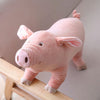 Peluche cochon joyeux