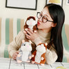 Peluche Hamster marron parlant plush, brown talking hamster toy held by girl with glasses.