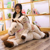 Peluche cheval beige couché