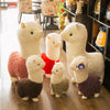 Peluche alpaga à robe colorée