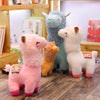 Peluche alpaga souriant et coloré