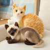 Peluche chat tigré orange couché
