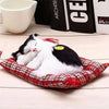 Peluche poupée chat tigré gris qui dort