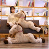 Peluche cheval beige couché