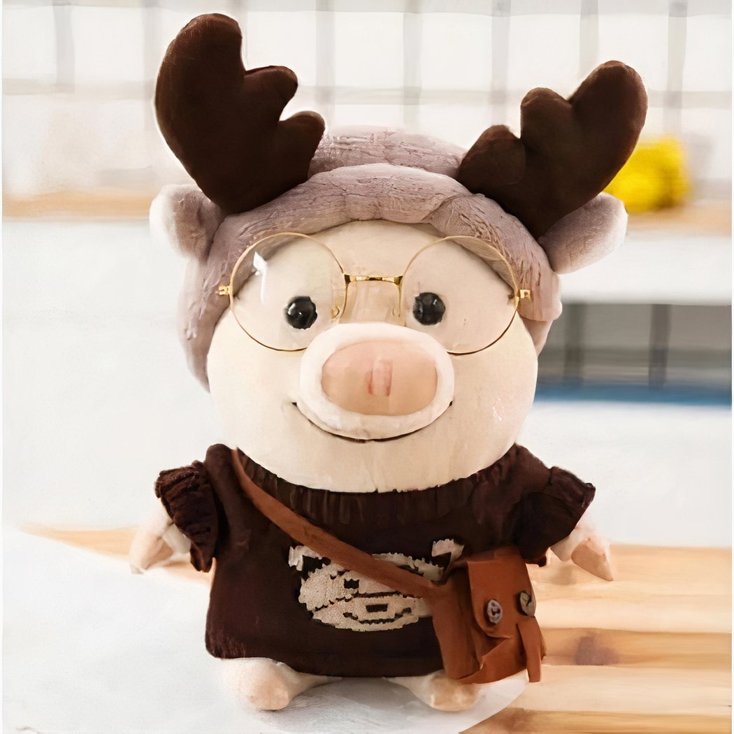 Peluche cochon habillé en renne