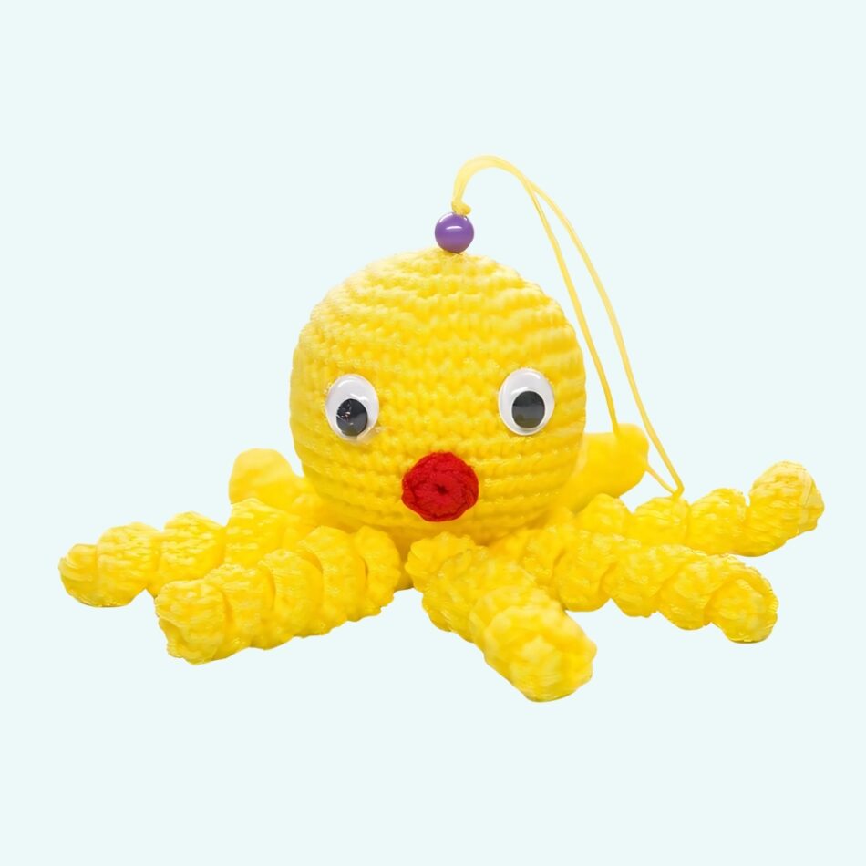 Peluche poulpe jaune douce tressée pour enfant