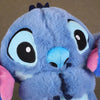 Peluche Stitch qui respire avec berceuse apaisante
