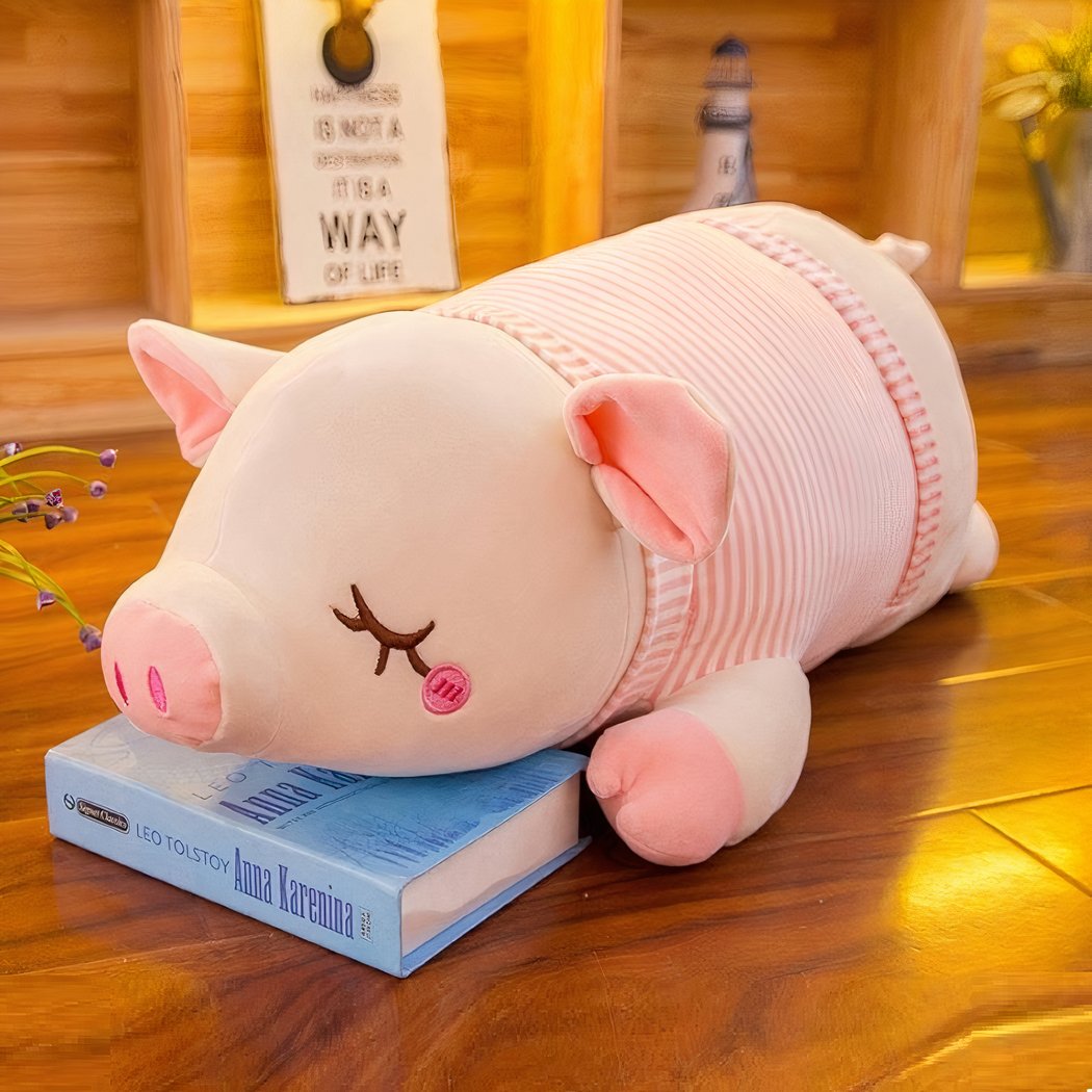 Peluche cochon avec petit nœud rose