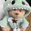 Nino – L’ours en peluche articulé fait main avec son déguisement de dinosaure