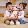 Peluche chat rose aux longues jambes