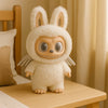 Peluche type Labubu ange blanc