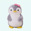 Peluche pingouin nœud rose