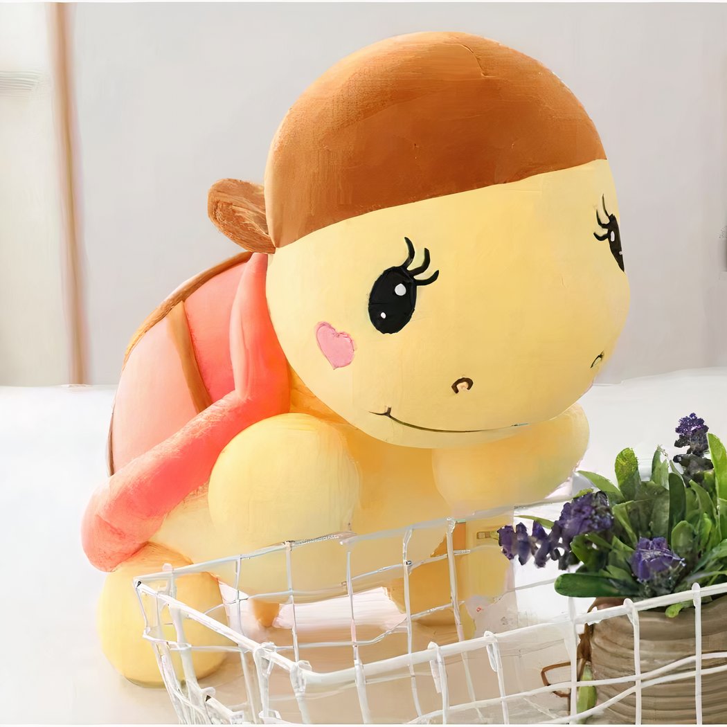 Peluche tortue rose à casquette