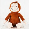Peluche singe souriante