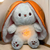 Peluche lapin carotte qui respire avec berceuses