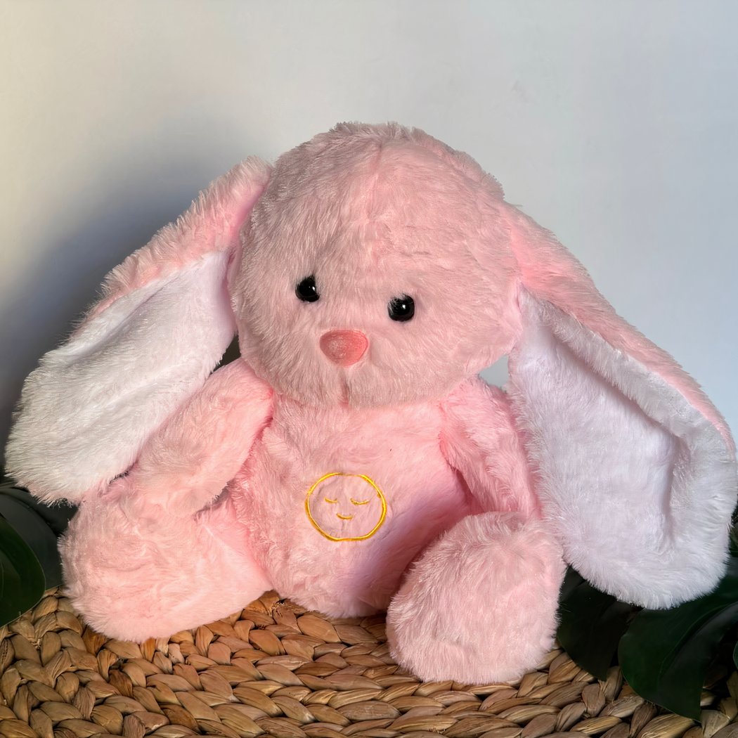 Peluche veilleuse de lapin rose qui respire
