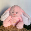 Peluche veilleuse de lapin rose qui respire