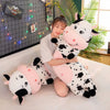 Peluche GÉANTE vache tachetée