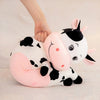 Peluche GÉANTE vache tachetée