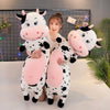 Peluche GÉANTE vache tachetée