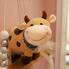 Peluche vache à motif coeur