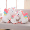 Peluche licorne blanche arc-en-ciel