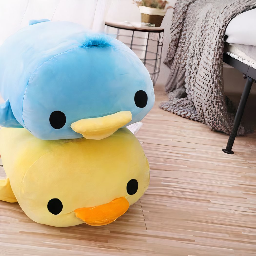 Peluche oreiller canard couché