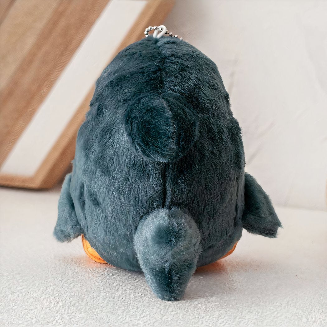 Poupée en peluche petit chat déguisé en requin