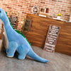 Peluche dinosaure bleu