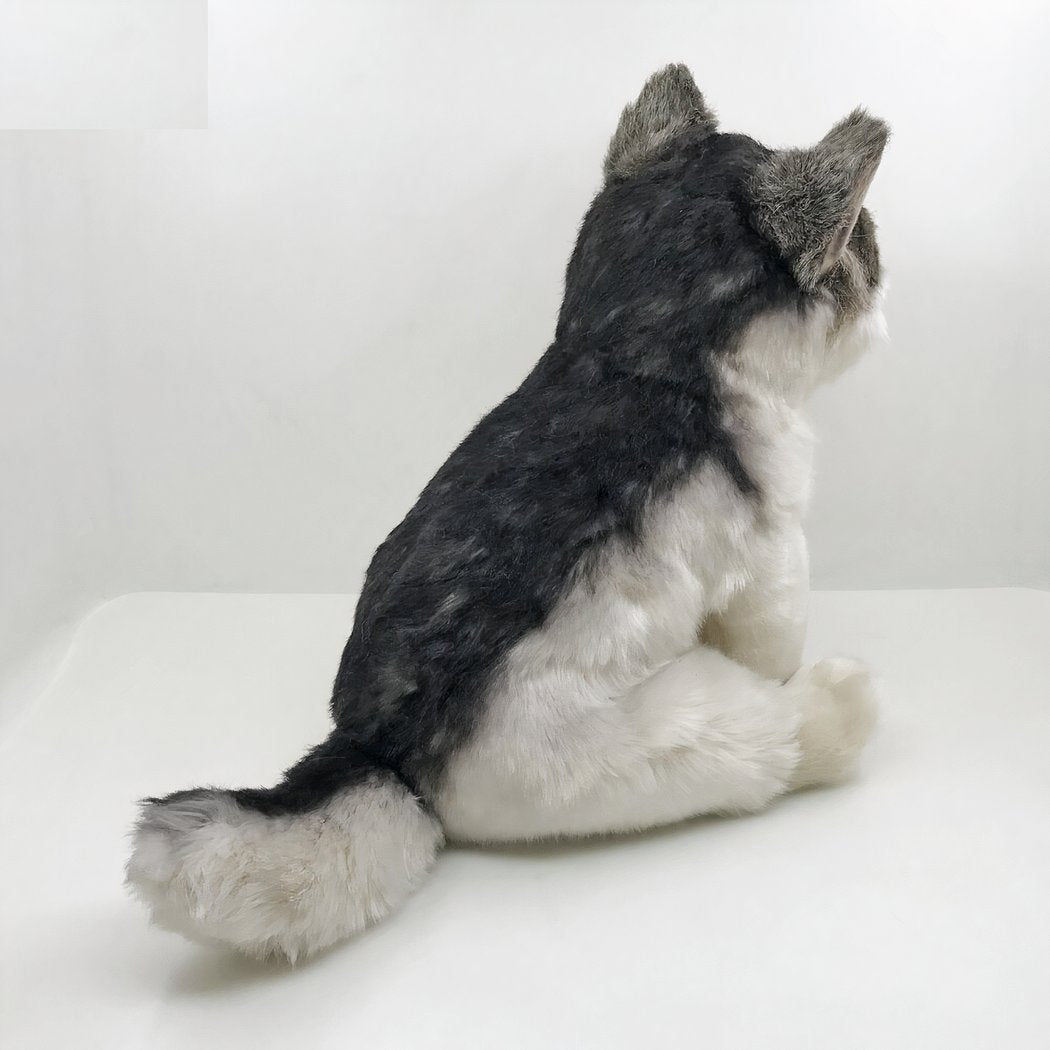 Peluche loup assis