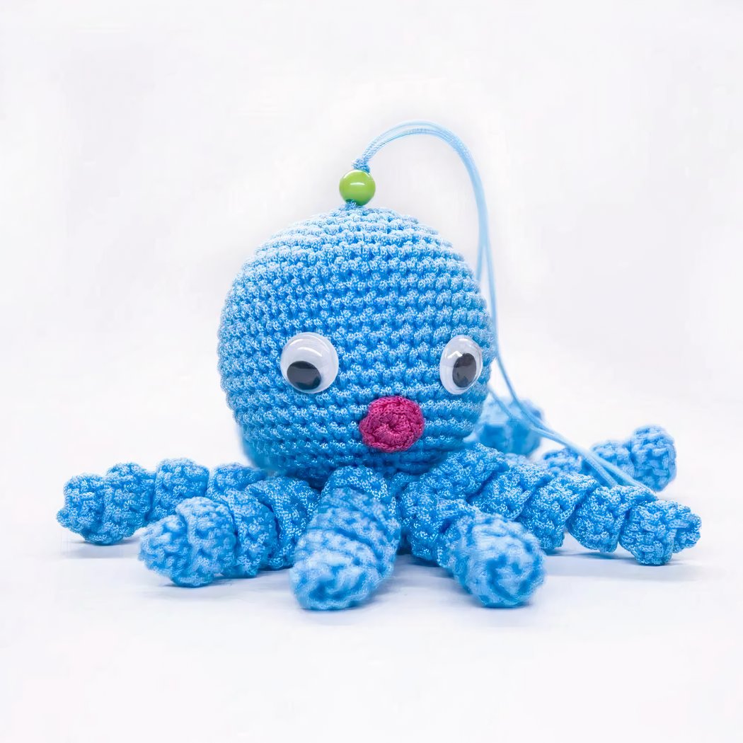 Peluche poulpe bleue douce tressée pour enfant