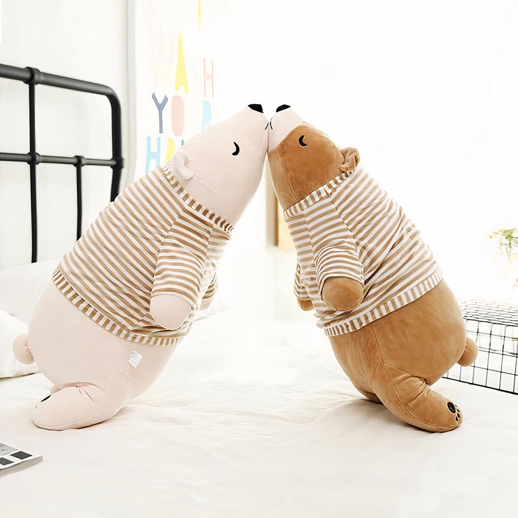 Peluche ours marron habillé qui dort