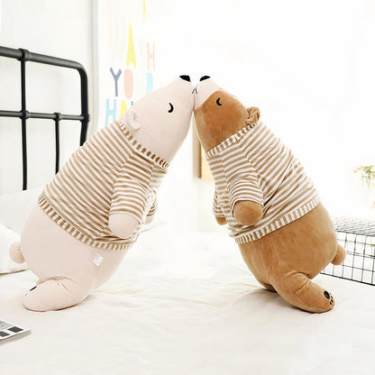 Peluche ours marron habillé qui dort