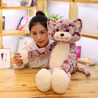 Peluche chat rose aux longues jambes