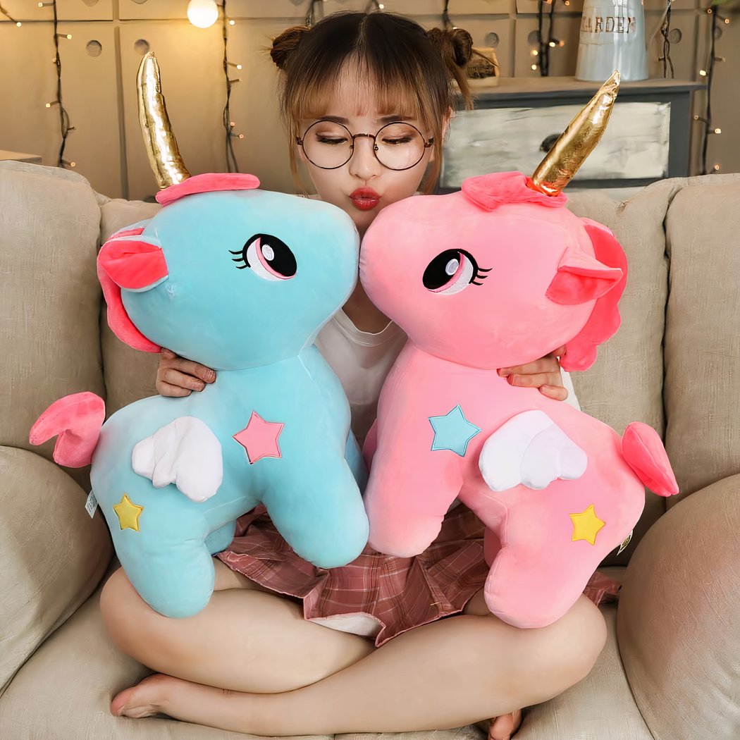 Peluche licorne bleue de corne dorée
