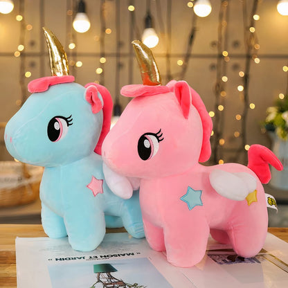 Peluche licorne bleue de corne dorée