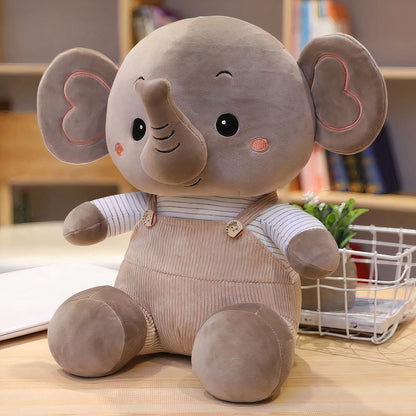 Peluche éléphant en salopette colorée
