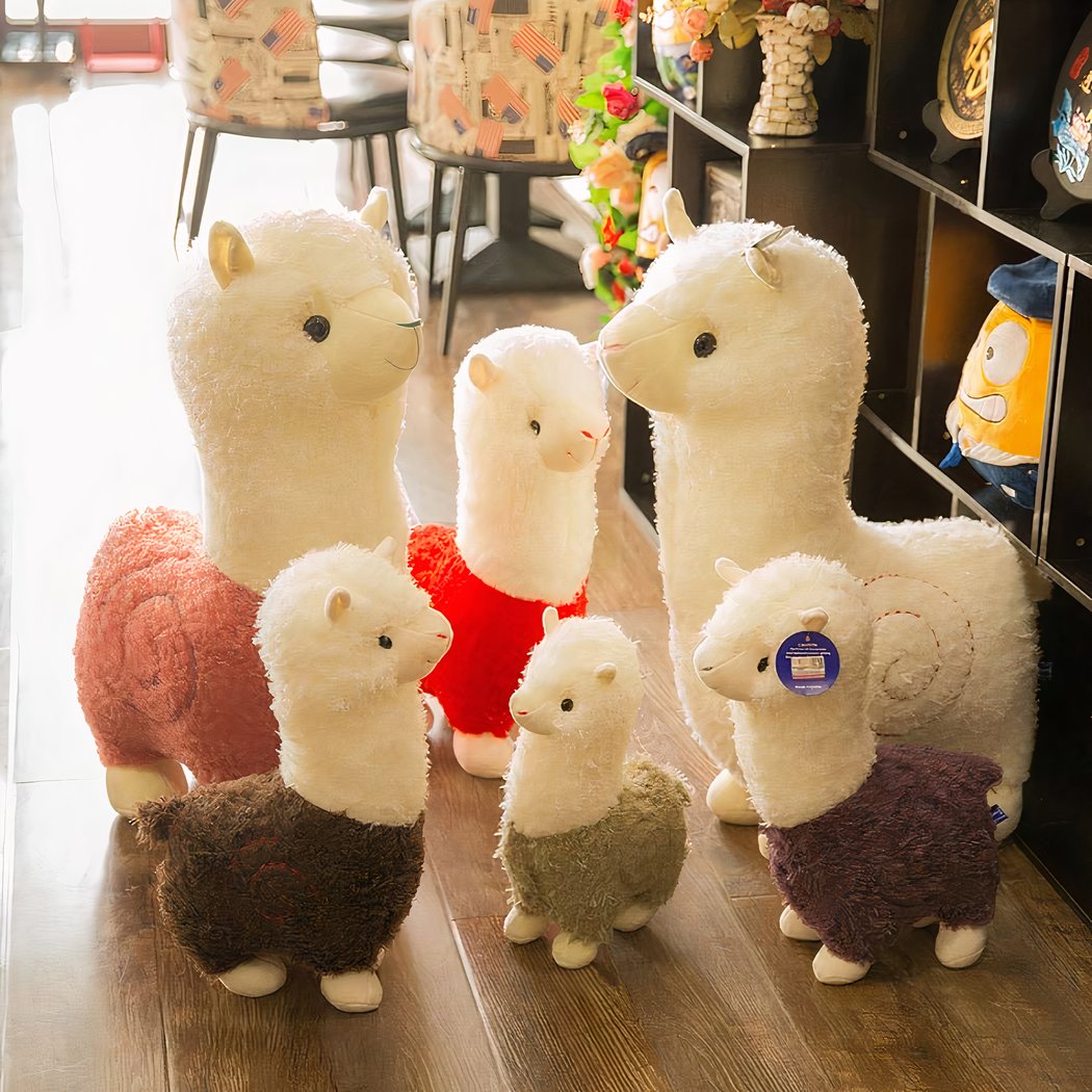 Peluche alpaga à robe colorée