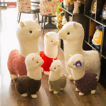 Peluche alpaga à robe colorée