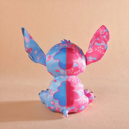 Peluche Stitch colorée rose et bleu clair Disney pour enfant