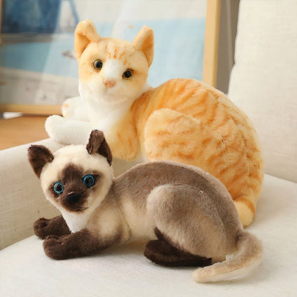 Peluche chat tigré orange couché
