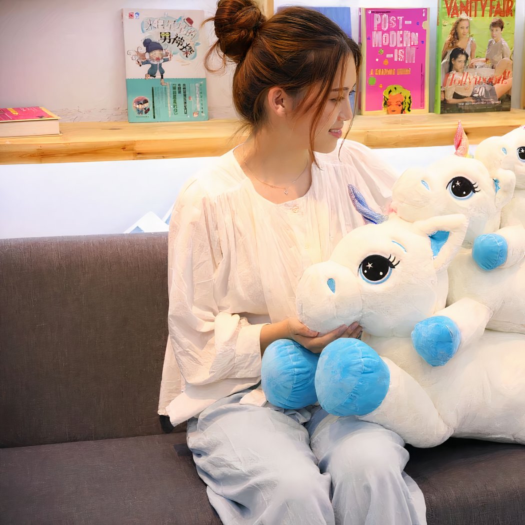 Peluche licorne bleu arc-en-ciel