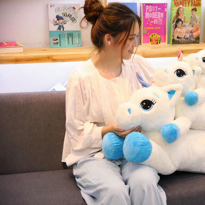 Peluche licorne bleu arc-en-ciel
