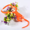 Peluche singe kawaii longue queue orange