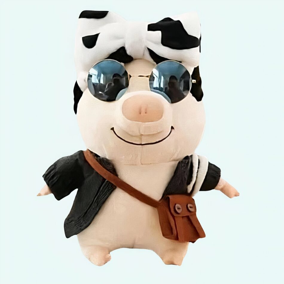 Peluche cochon habillé avec noeud vache