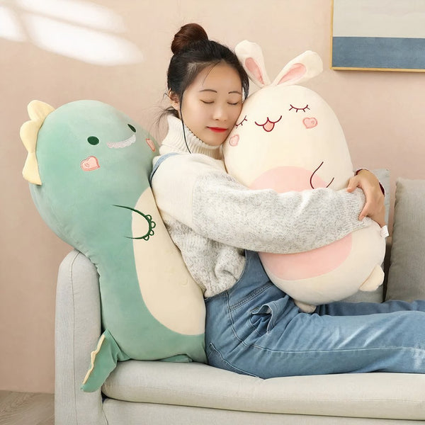 Peluche Squishmallow dinosaure tout doux